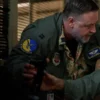 Russell-Crowe-Land-of-Bad-2024-Eddie-Grimm-Green-Jacket