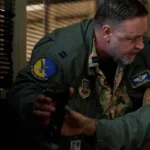 Russell-Crowe-Land-of-Bad-2024-Eddie-Grimm-Green-Jacket