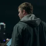 Peter Sutherland The Night Agent S02 Grey Jacket Back